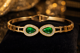 Emerald Elegance Gold Bangle