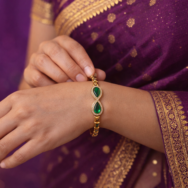 Emerald Elegance Gold Bangle